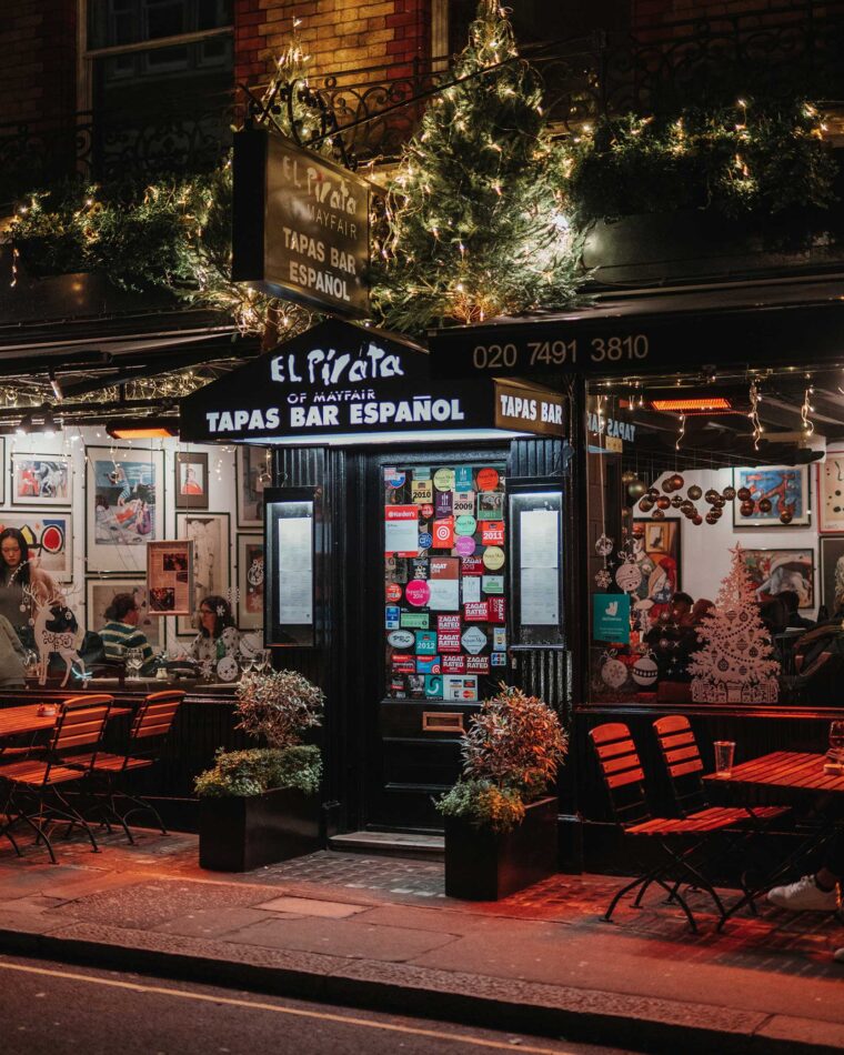 Spanish Christmas party drinks setup at El Pirata Mayfair featuring sherry, Rioja, and Cava with tapas sharing platters
