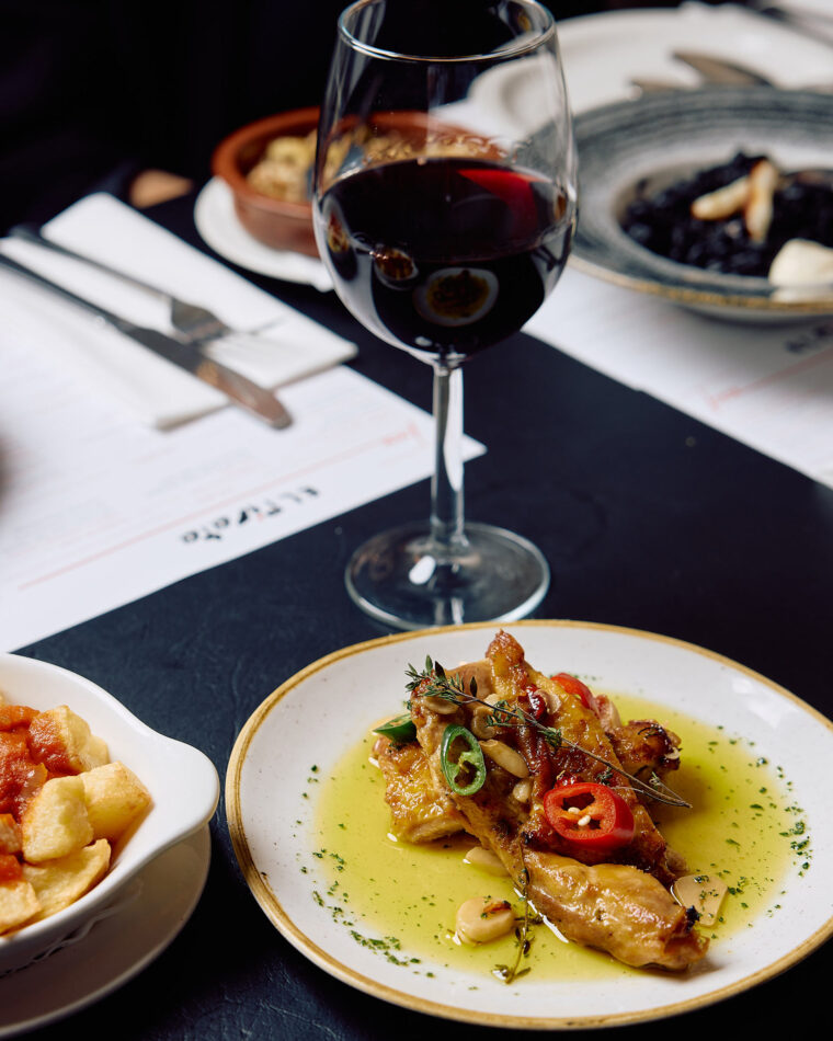 A variety of classic Spanish tapas dishes laid out on a table for lunch.