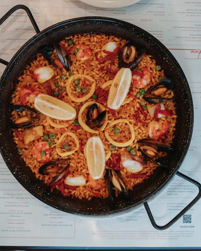 Paella’s rice dish available at El Pirata Tapas Bar Español a Mediterranean Restaurant in London’s Mayfair Hyde Park Corner and Green Park.