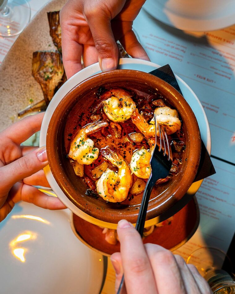Introduction to Tapas a sharing menu for two including grilled artichokes & alioli, meatballs, lamb fillet mushrooms with garlic.