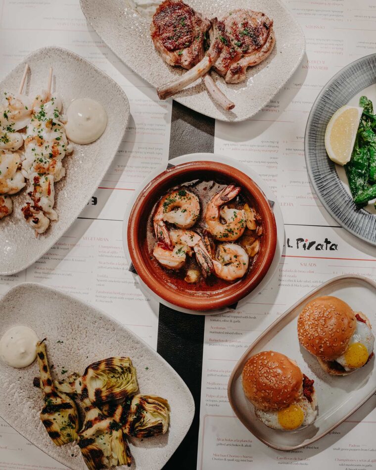 Enjoy a leisurely evening dinner menu at El Pirata of Mayfair, Pimientos de Padrón Small green peppers from Galicia Prawns olive oil.