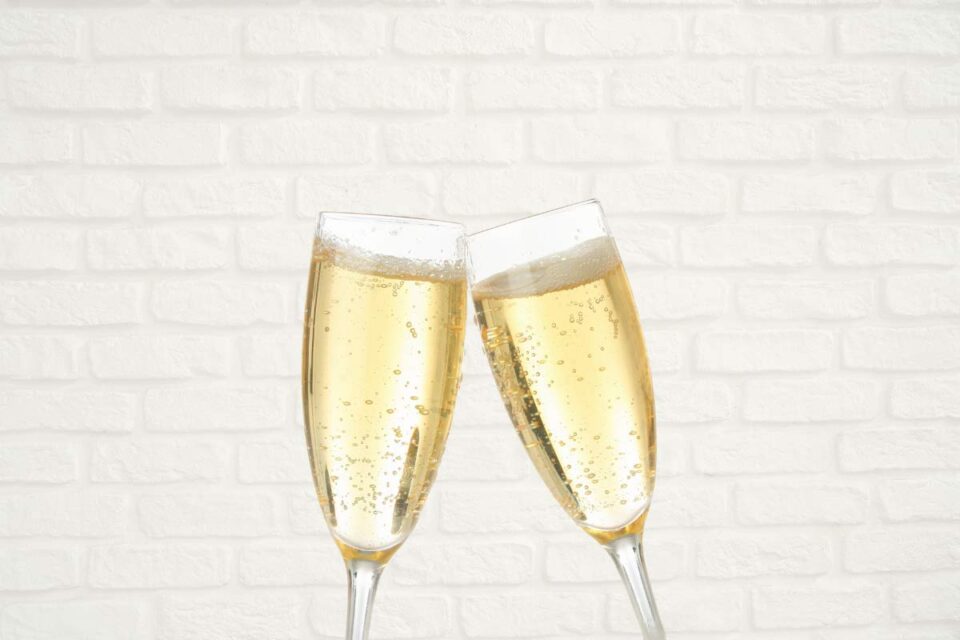 Glass of celebratory cava in Mayfair London
